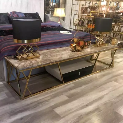 میز tv استیل به رنگ طلایی با رویه سنگ